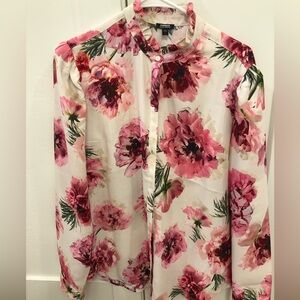 Express blouse in like new condition. 100% polyester.